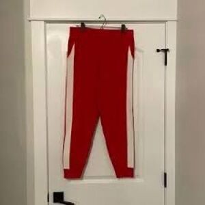 Women's Red Joggers with White Stripe. Item # 11324